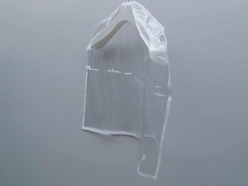 Чохол-накидка прозорий для зберігання одягу 60*50 см 60*50 белый кант фото